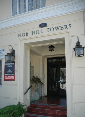 The entrance to Nob Hill Towers is open.